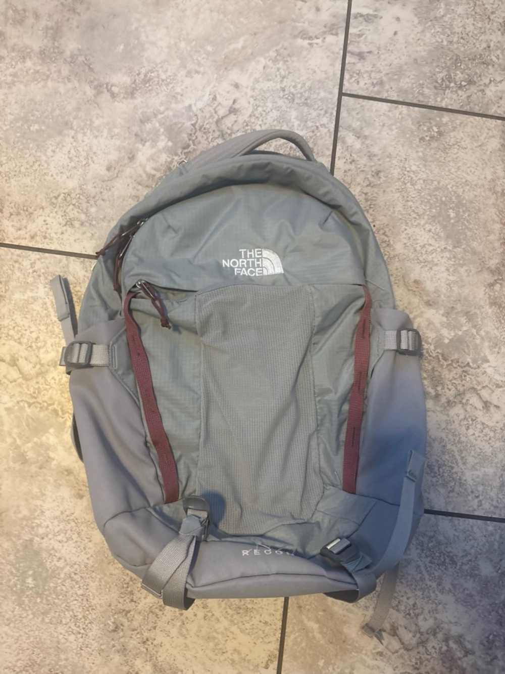 The North Face Gray Backpack with Maroon Accents